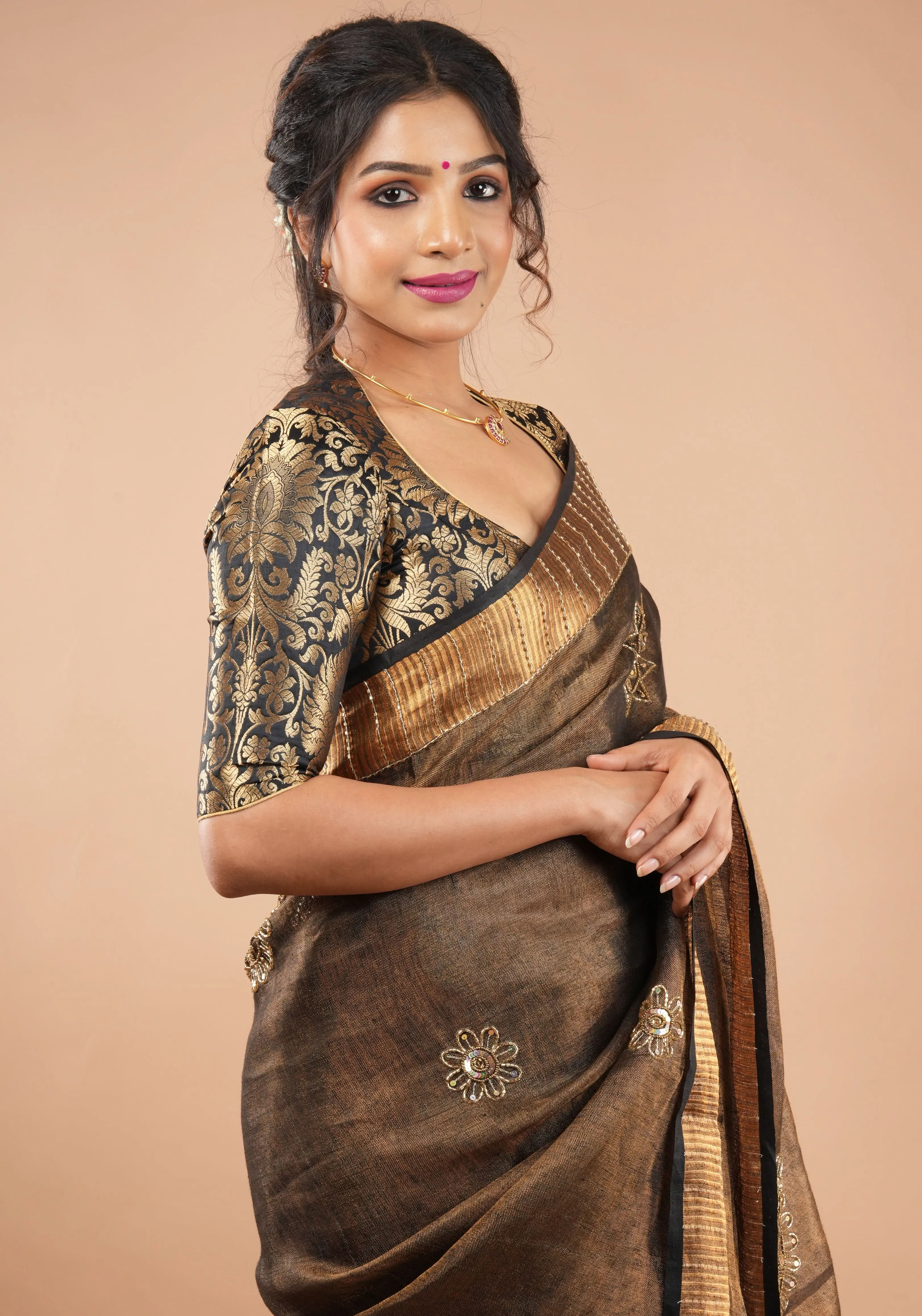 Embroidery cut dana with seqins Work Tissue Linen Saree in copper black with dramatic work Pallu