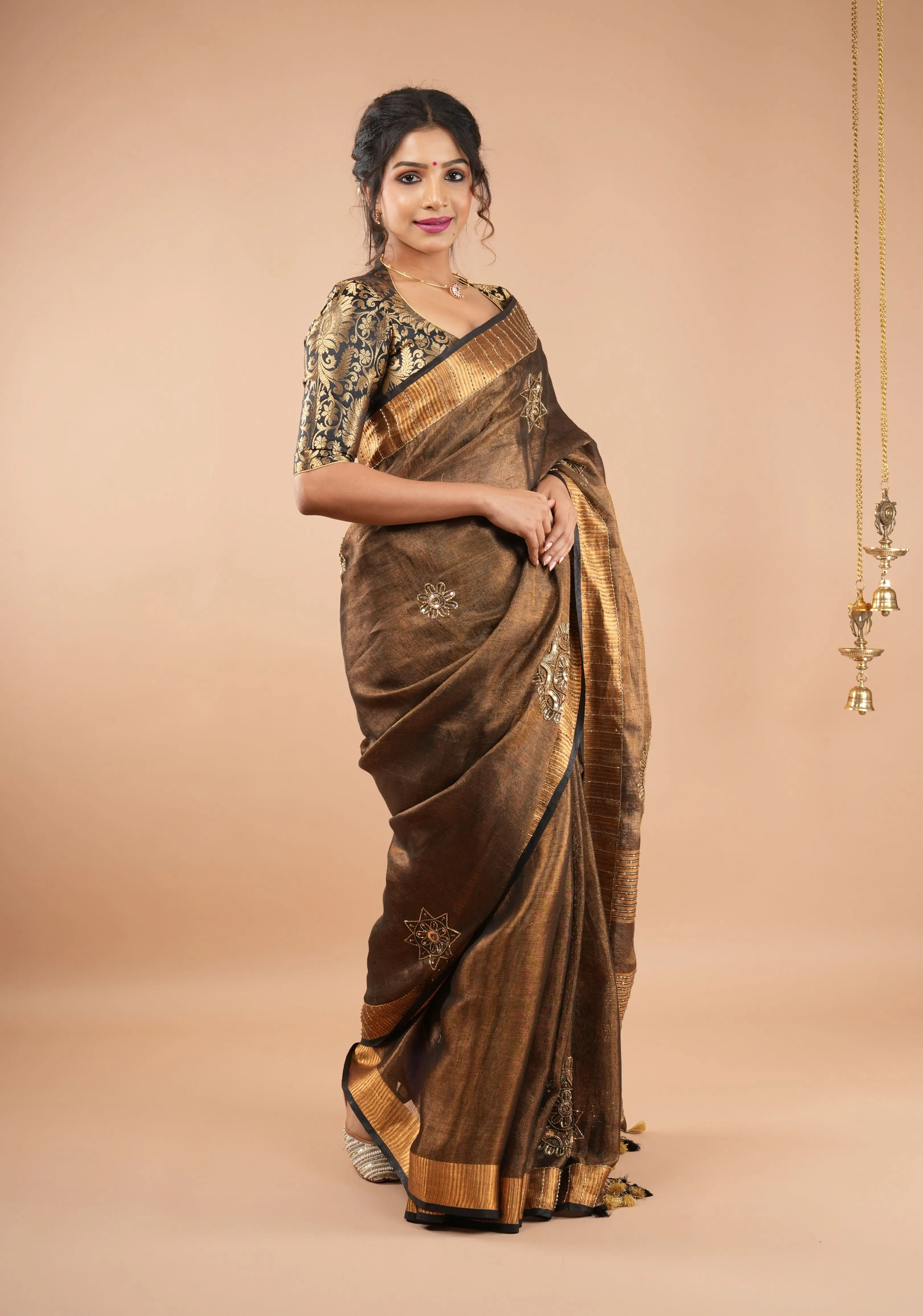 Embroidery cut dana with seqins Work Tissue Linen Saree in copper black with dramatic work Pallu