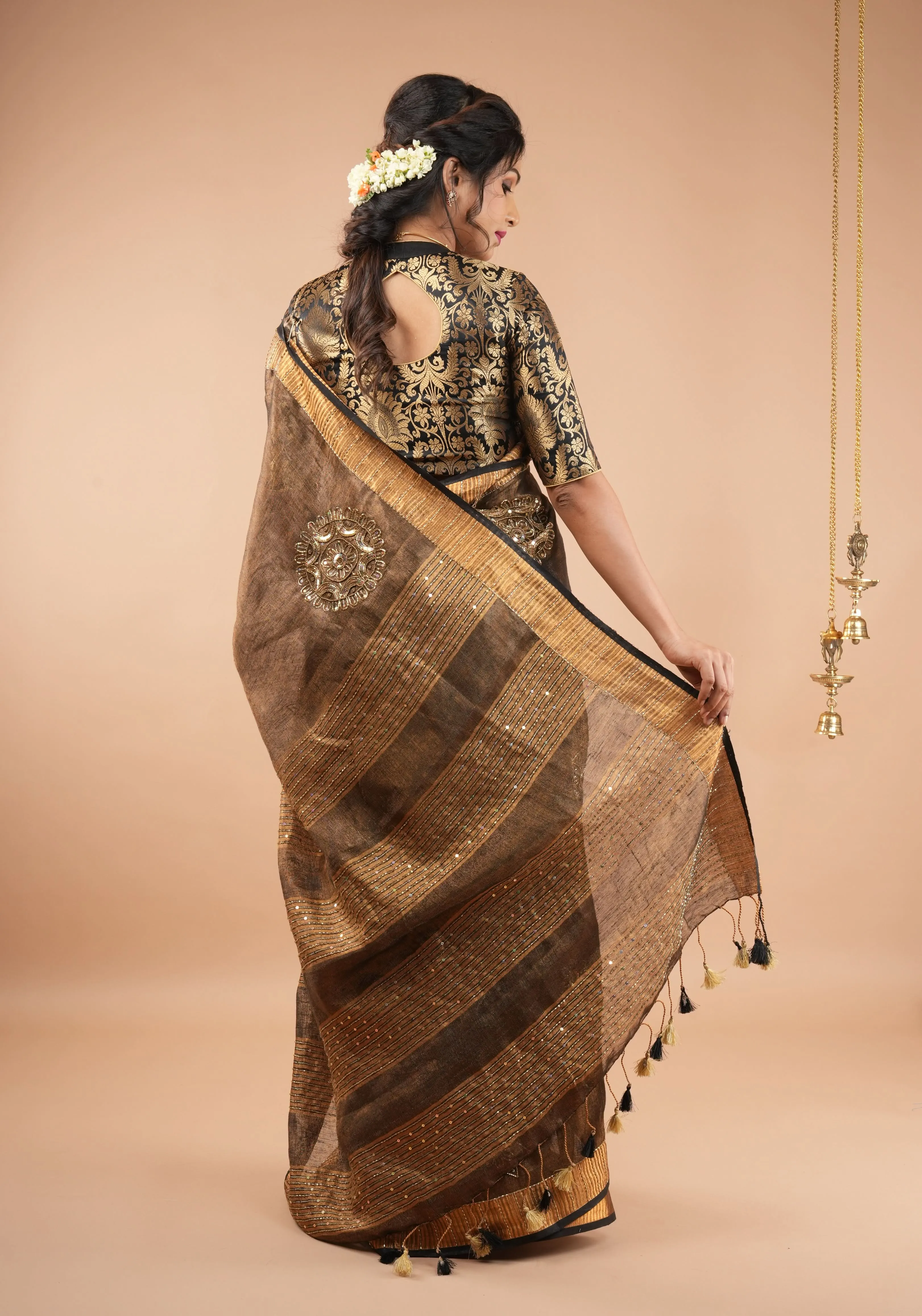 Embroidery cut dana with seqins Work Tissue Linen Saree in copper black with dramatic work Pallu