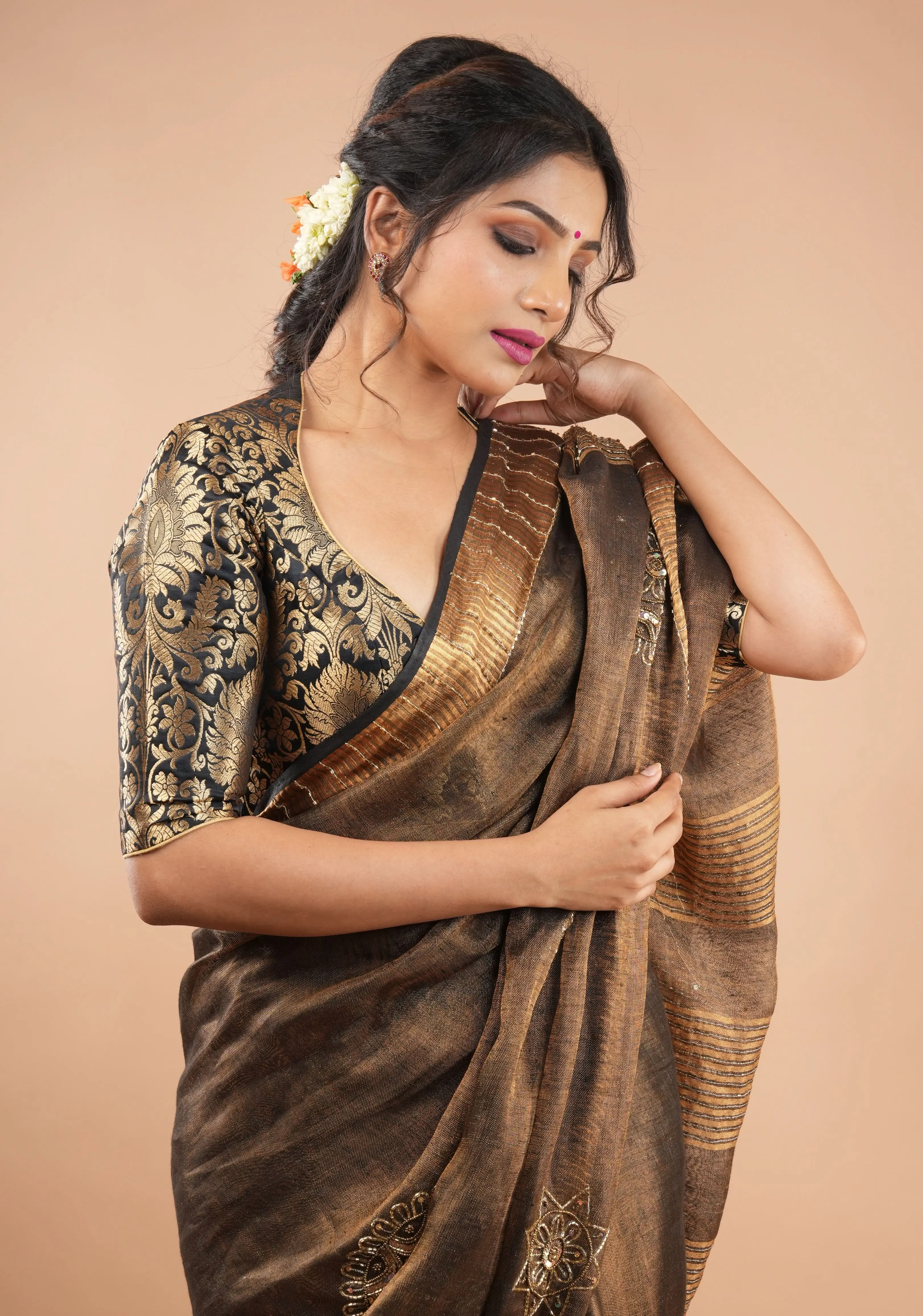 Embroidery cut dana with seqins Work Tissue Linen Saree in copper black with dramatic work Pallu